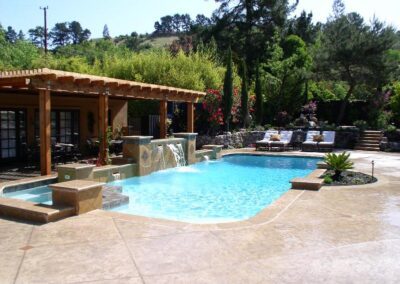 Hardscape and landscaping around pool